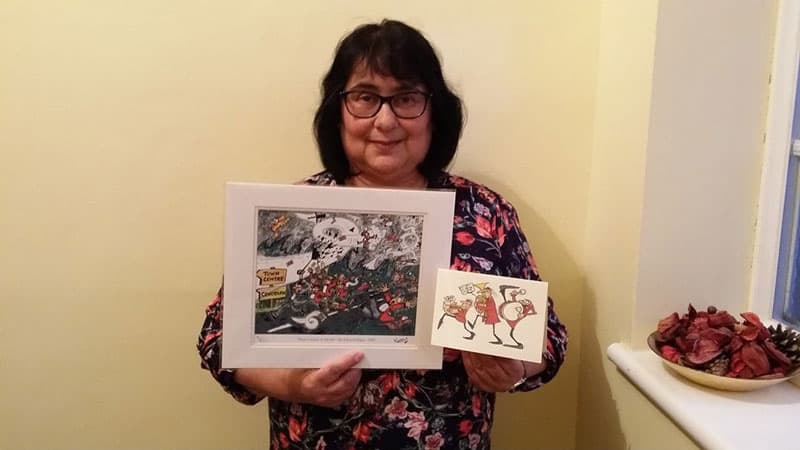 Mary Goodland, with one of my limited edition prints 'There's music In The Air' which she won in the "Name that tune" competition on Sounds of Brass last Wednesday, 1st May.